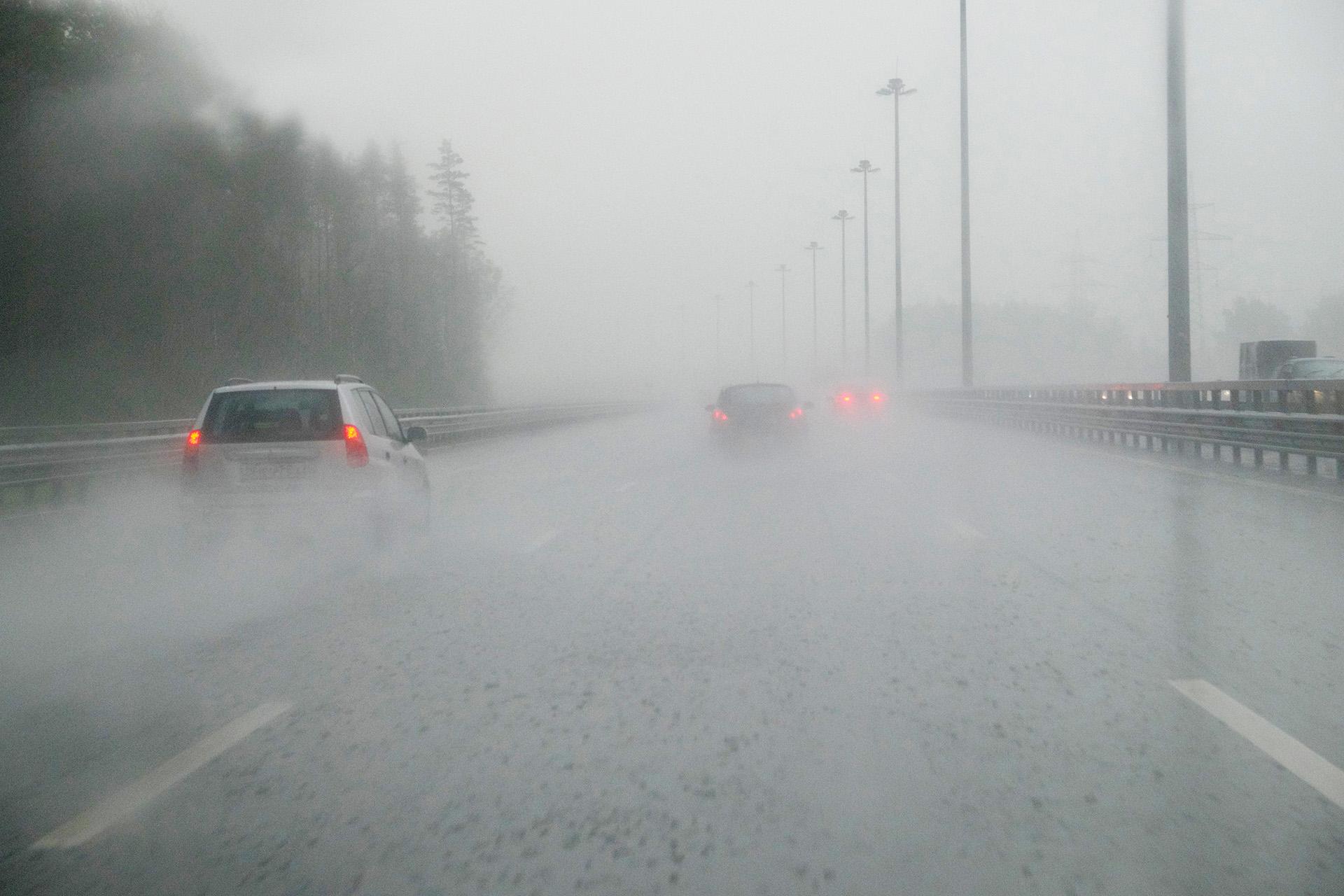 cars driving in rain